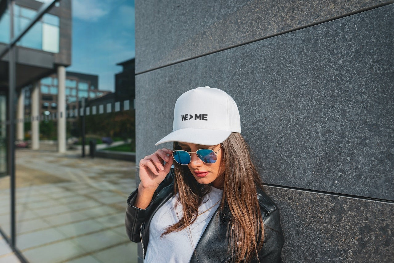 WE > ME Caps